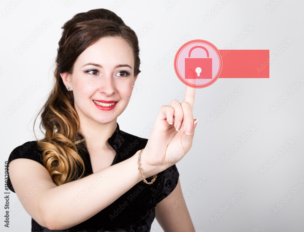 technology, internet and networking concept. beautiful woman in a black business shirt. woman presses lock button on virtual screens, empty field for notes technology, internet and networking concept. beautiful woman in a black business shirt. woman presses lock button on virtual screens, empty field for notes