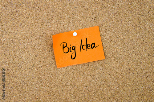 Big Idea written on orange paper note