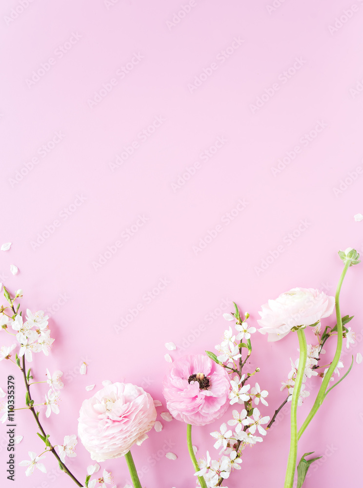 beautiful spring flowers at pink background.frame composition