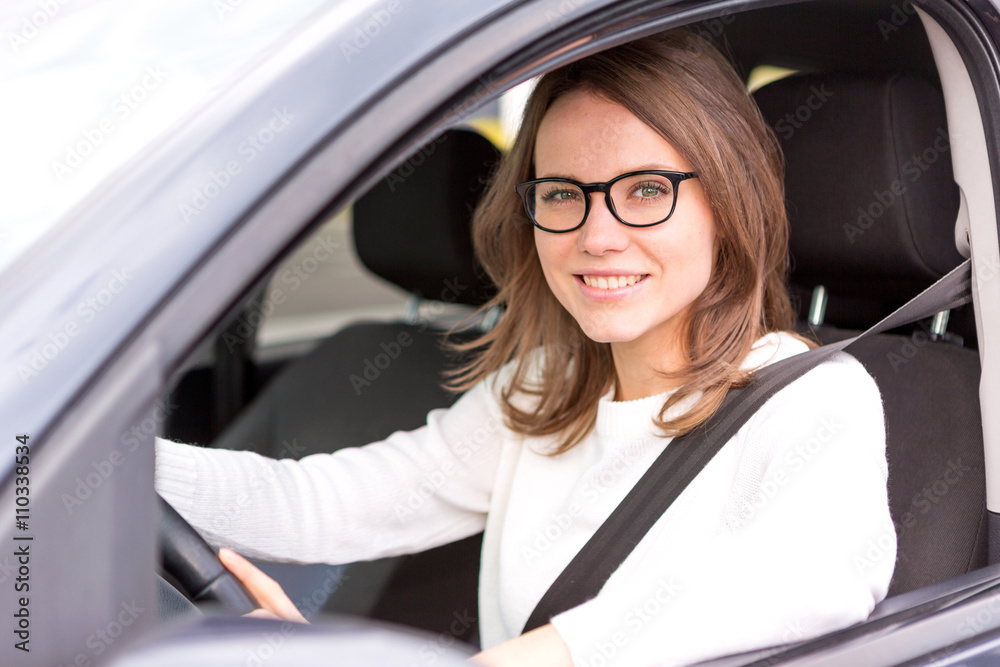 Young attractive woman driving his car Young attractive woman driving his car