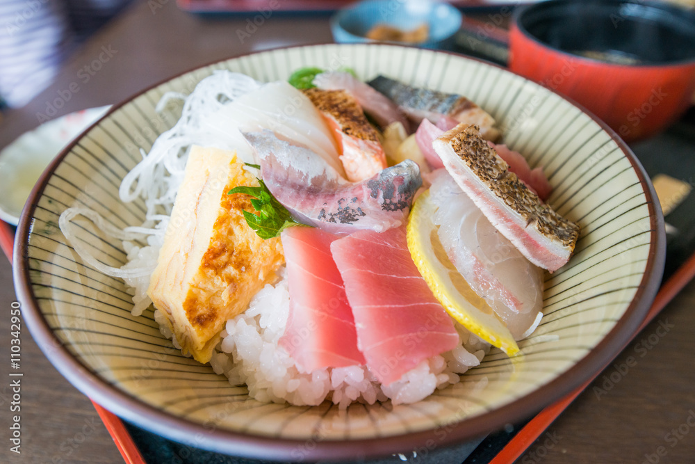 Japanese raw fish selection cut and presented on a long plate Japanese raw fish selection cut and presented on a long plate