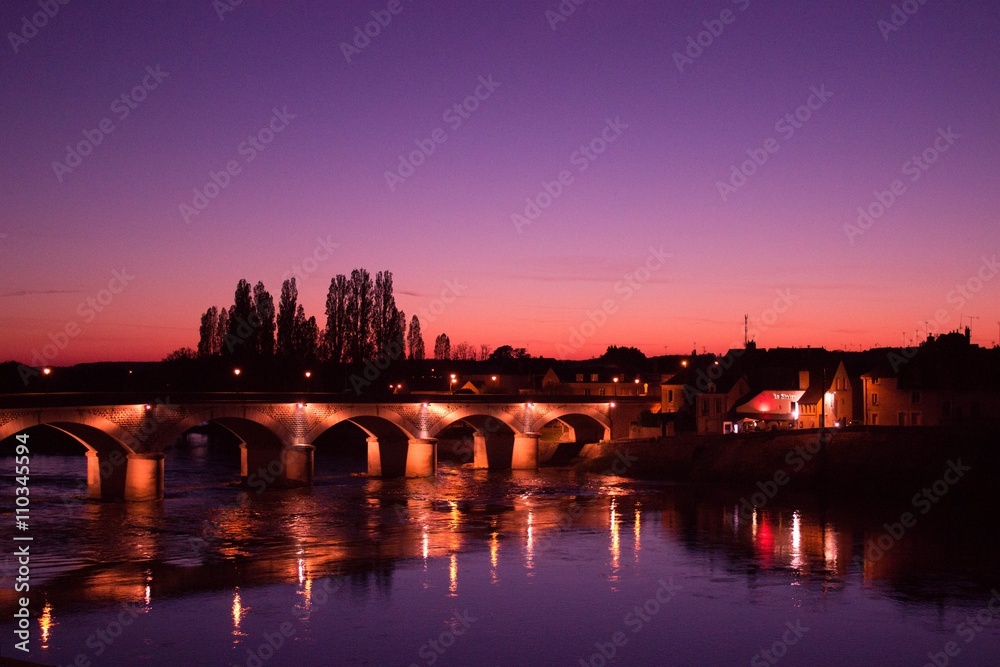 Sunset over the river in Amboise, France  