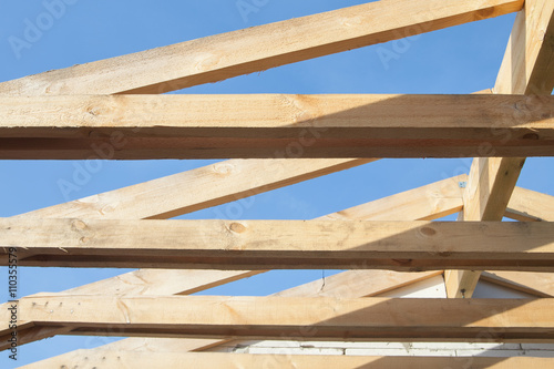 Wooden roof with rafter style framing