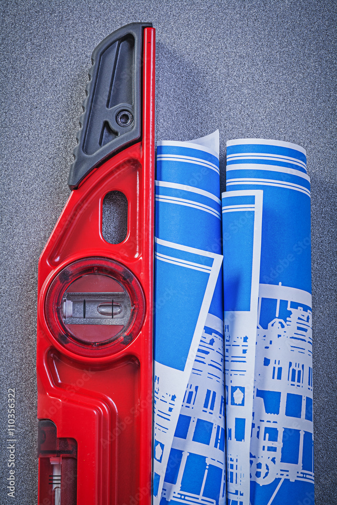 Fototapeta premium Construction level blue engineering drawings on grey background 