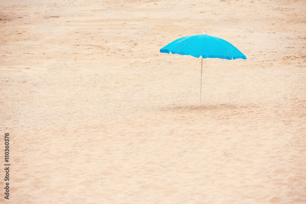 Umbrella in the middle of the beach