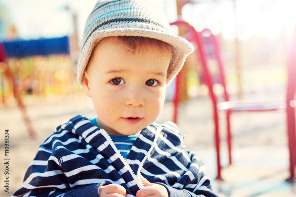 Little boy playing on playground Little boy playing on playground