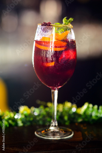 wine cocktail with mint garnish.
