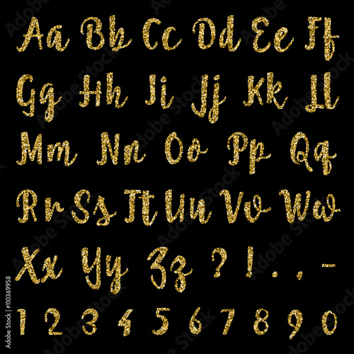 Gold alphabet isolated on black background.