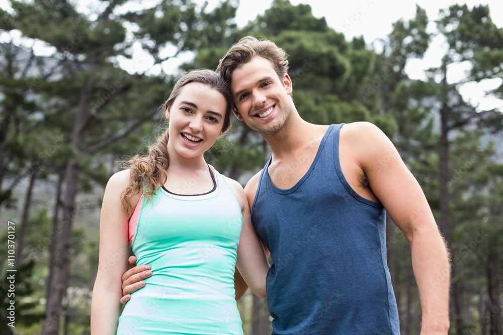 Portrait of happy couple against trees Portrait of happy couple against trees