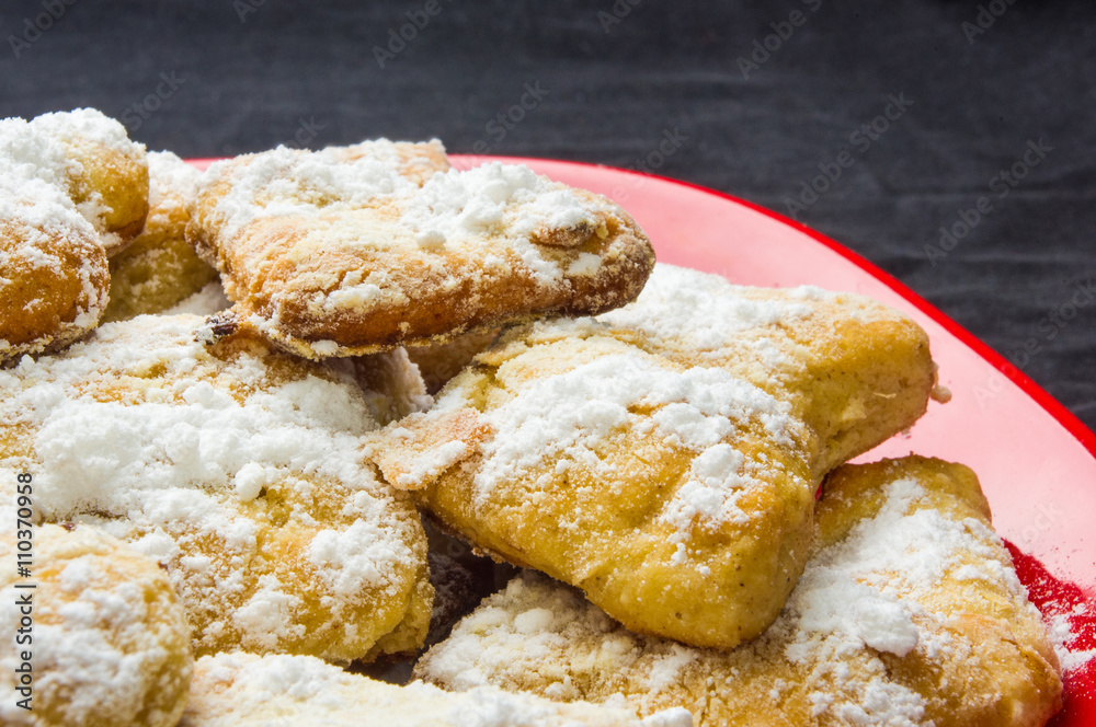 homemade cookies in powdered sugar