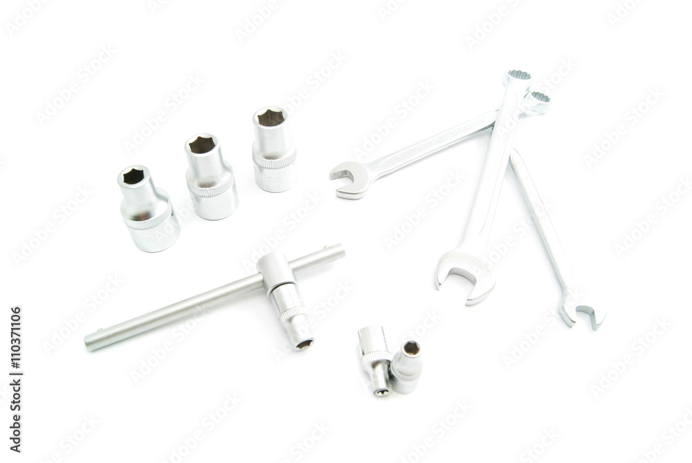 heads and different wrenches on white heads and different wrenches on white