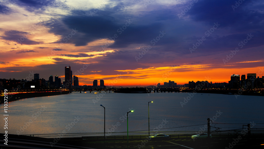 Silhouette cityscape at Han river and beautiful sunset in seoul,