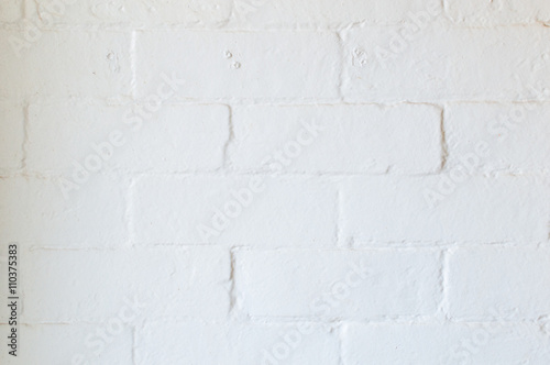 Imperfect interior white painted brick wall background