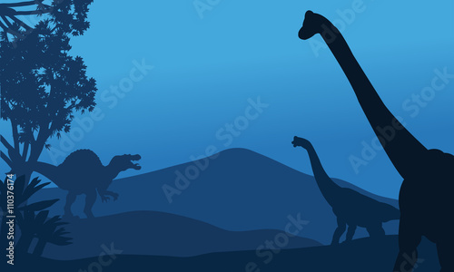 Silhouette of brachiosaurus and spinosaurus