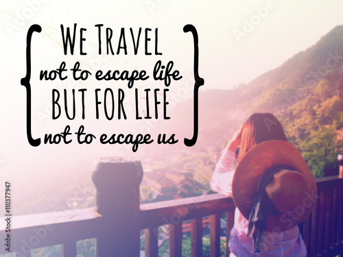 Obraz na plátně Inspirational quote we travel not to escape life on blurred background with vi