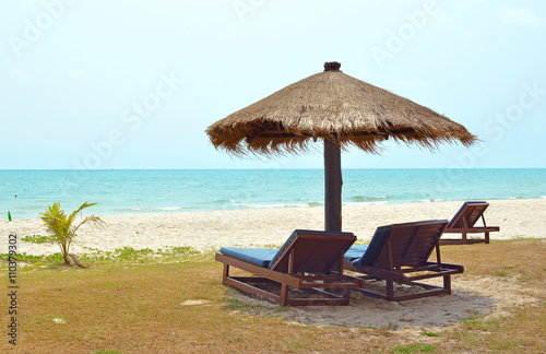 Fototapeta Naklejka Na Ścianę i Meble -  Summer, Travel, Vacation and Holiday concept - Beach Chairs and
