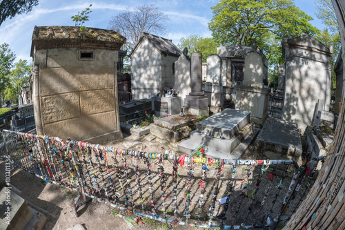 PARIS, FRANCE - MAY 2, 2016: Jim Morrison grave in Pere-Lachaise cemetery photo