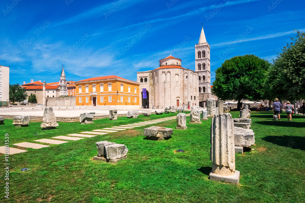 Church of st. Donat, a monumental building from the 9th century with historic roman artefacts in foreground in Zadar, Croatia