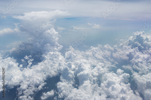 Above the clouds.Aerial cloudscape sky in stratosphere shot from airplane window