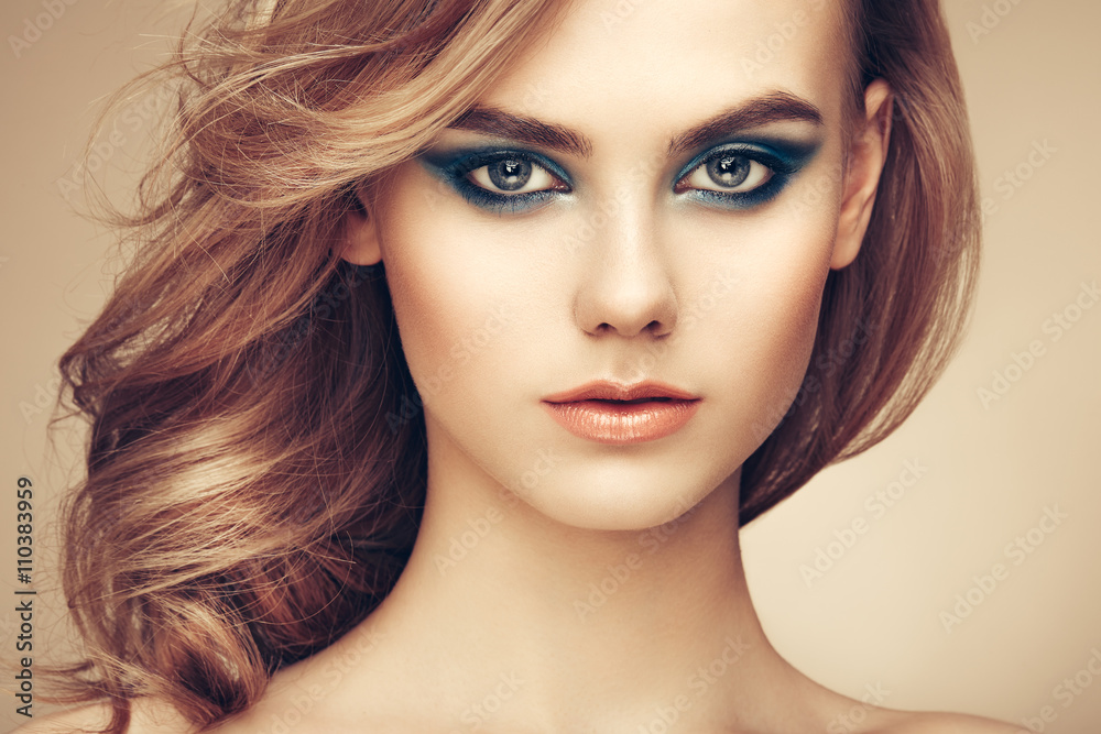 Fototapeta premium Portrait of beautiful sensual woman with elegant hairstyle. Perfect makeup. Beauty fashion. Eyelashes. Lips. Cosmetic Eyeshadow