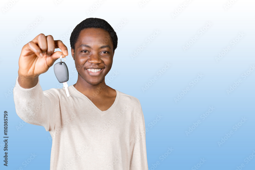 Fototapeta premium Young man with the keys standing