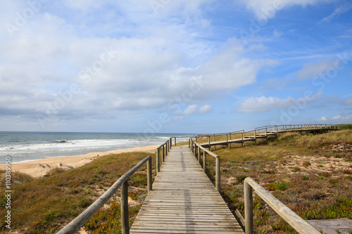 Landscape of portuguese beach with wooden walkway  Portugal