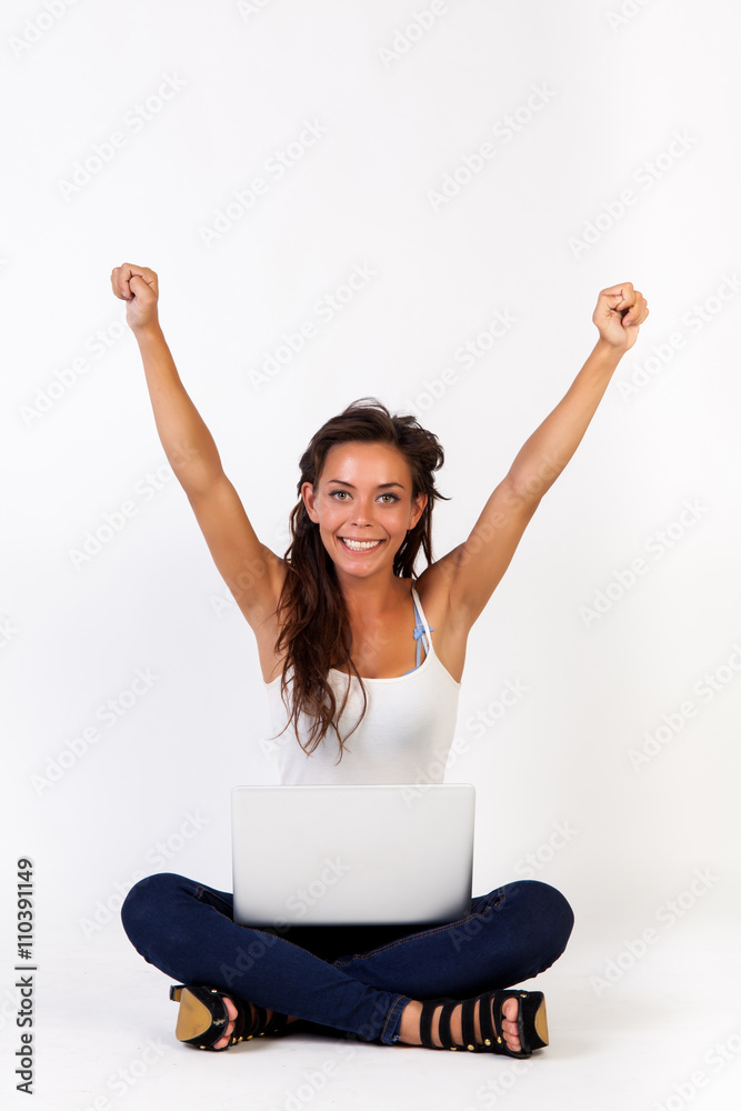 Woman with laptop on isolated white background - work anywhere, success, freedom concept Woman with laptop on isolated white background - work anywhere, success, freedom concept