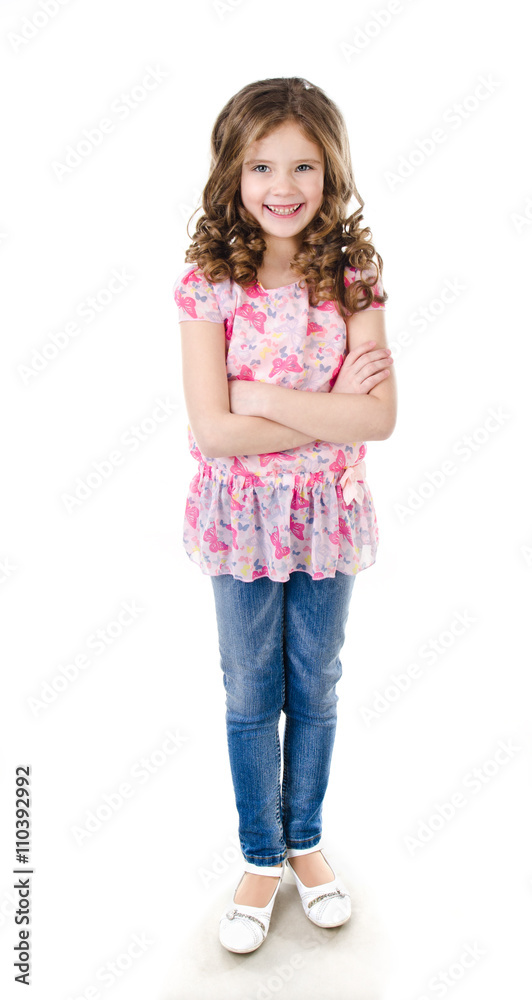 Cute smiling little girl in jeans isolated Cute smiling little girl in jeans isolated