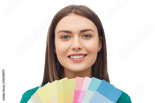 smiling young woman with color swatches