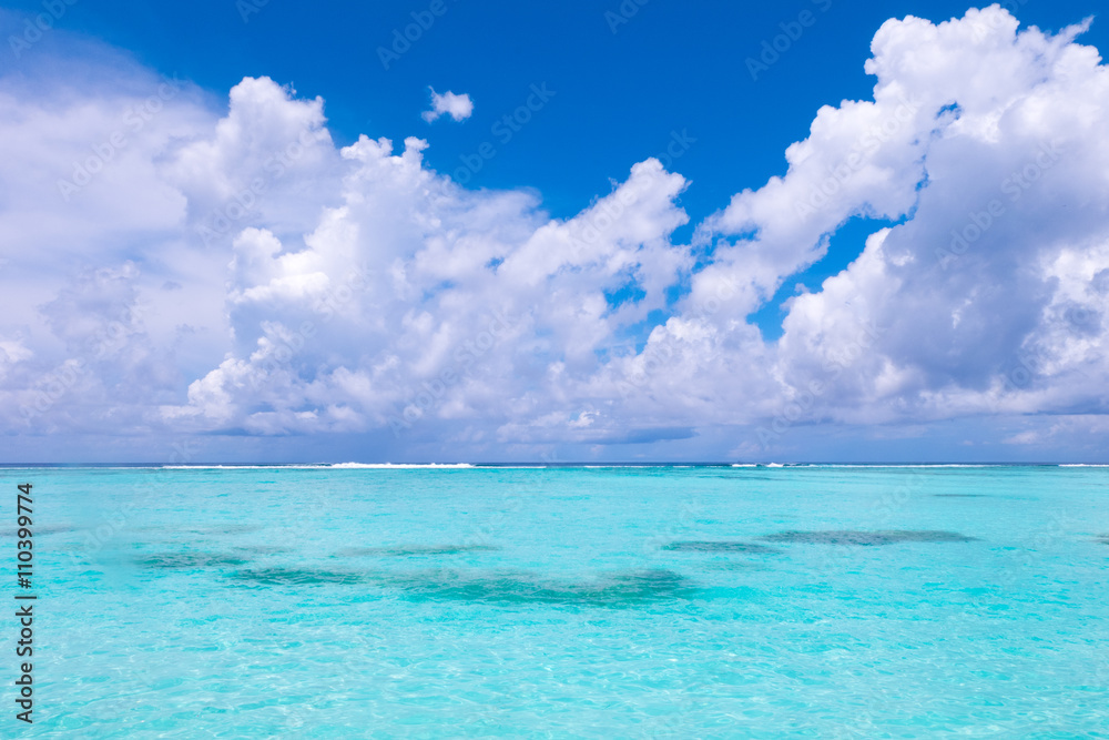 Beach in Maldives with blue sky background.