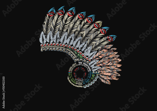 American Indian headdress with feathers on black background