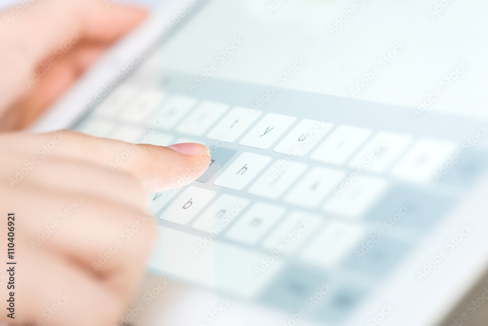 Hand touching screen on modern digital tablet pc. Hand touching screen on modern digital tablet pc.