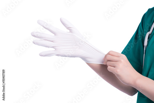 Fototapeta Naklejka Na Ścianę i Meble -  Doctor wearing gloves
