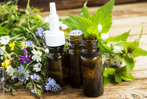 Herbal medicine with plants exracts and essence bottles