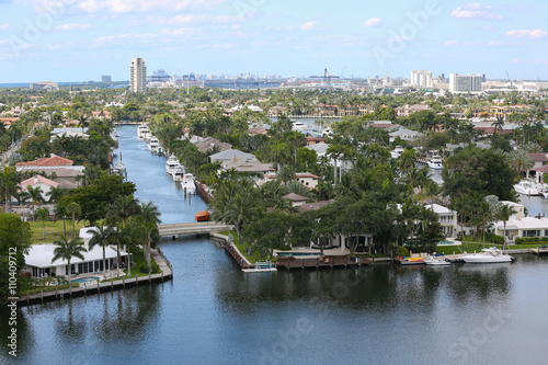 Aerial view of Fort Lauderdale's Intracoastal waterway canals, residential homes and skyline.