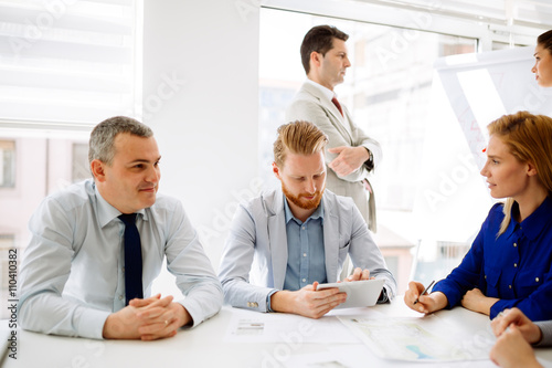 Businesspeople collaborating in office