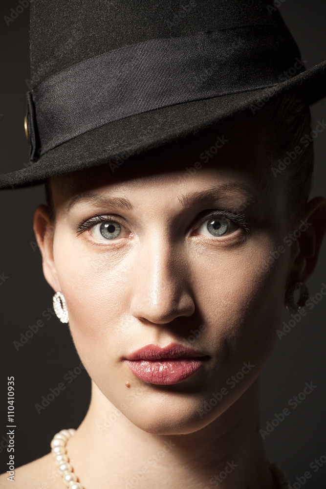Portrait of a beautiful young model in black hat Portrait of a beautiful young model in black hat