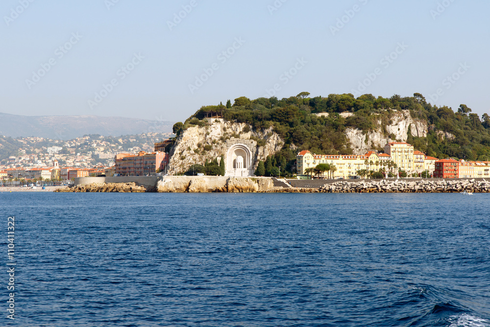 Monument aux Morts along with luxury houses, apartments and condominiums along the Mediterranean coast of the French Riviera near Nice, France. Horizontal with copy space for text