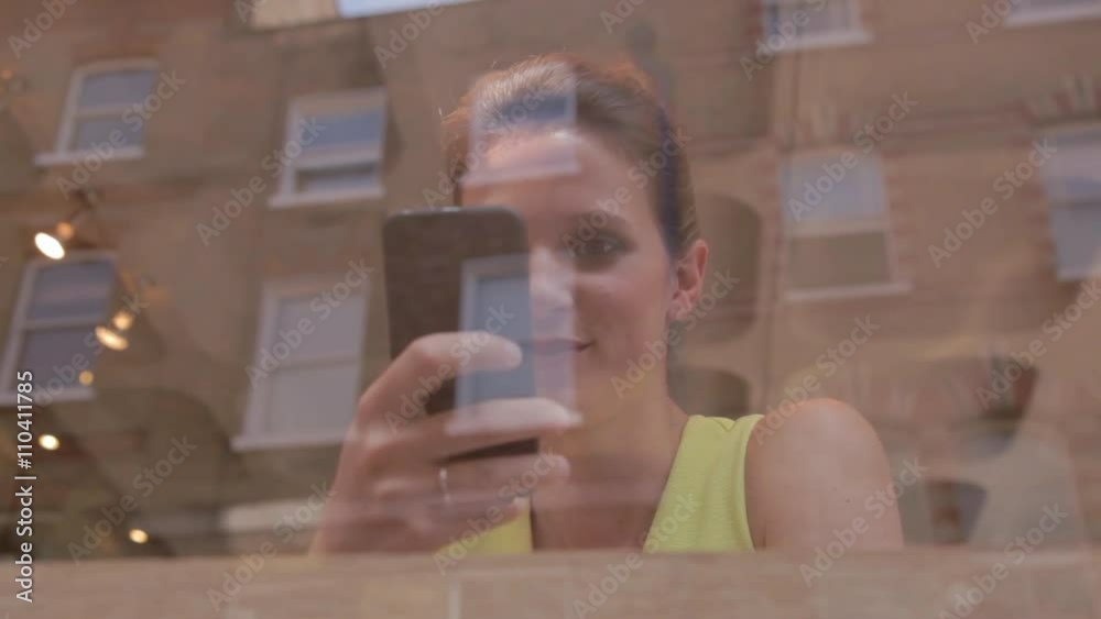 Woman using mobile phone