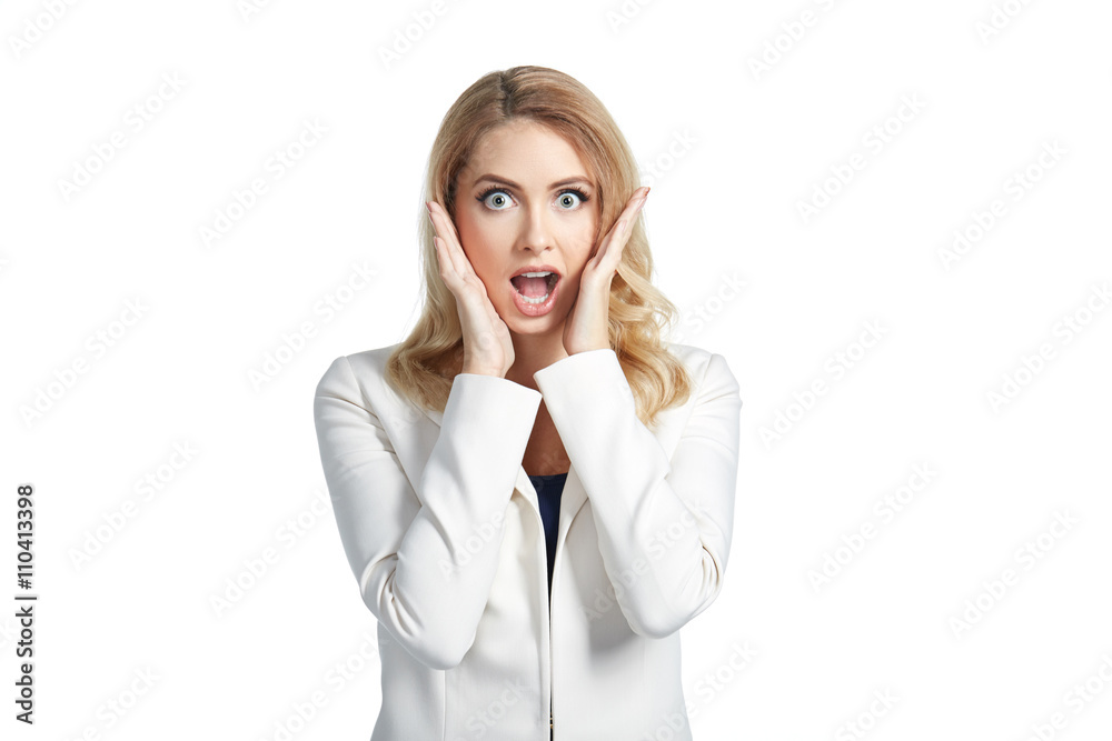 Beautiful young woman wonders on light background. Business concept Beautiful young woman wonders on light background. Business concept