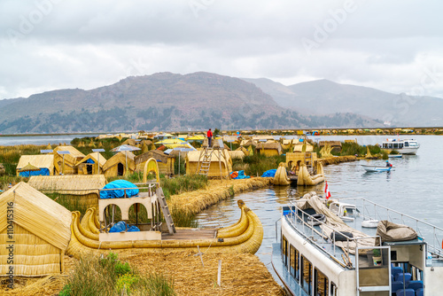 Bild auf Leinwand View at the Floating Island Los Uros with typical boats
