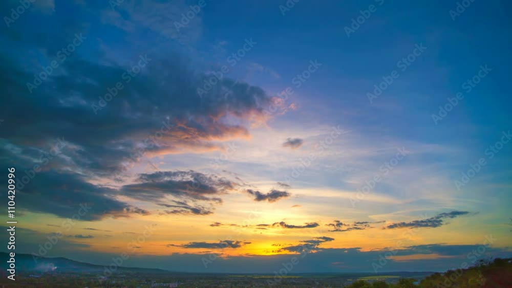 4 in 1! The flow of rain cloud over the city on the background of sunset
