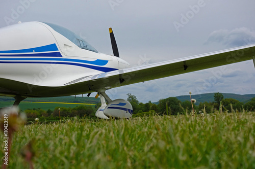 Small sport aircraft at the airport