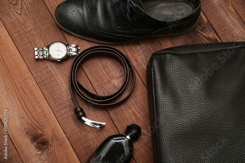 Collection of man's business accessories and clothes.