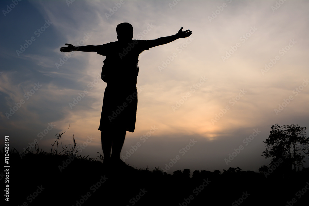 Man silhouette tourists.Background sunset Man silhouette tourists.Background sunset