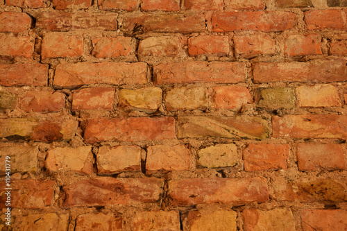 Red brick wall with cement