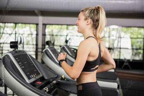 Woman walking on treadmill