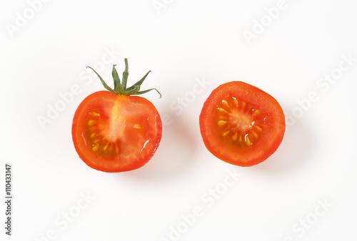 halved raw tomato