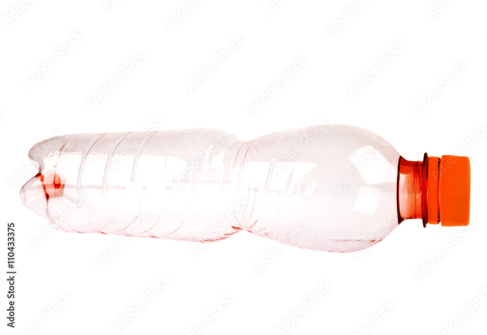 Used red plastic bottle on a white background Used red plastic bottle on a white background