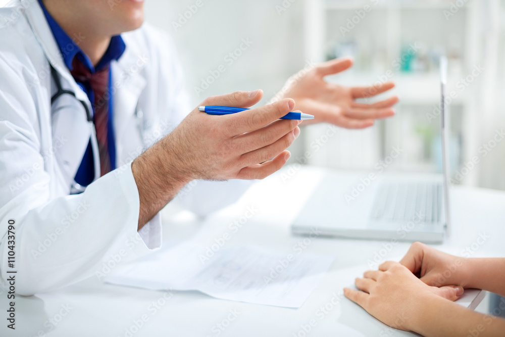 Doctor is having discussion with patient Doctor is having discussion with patient